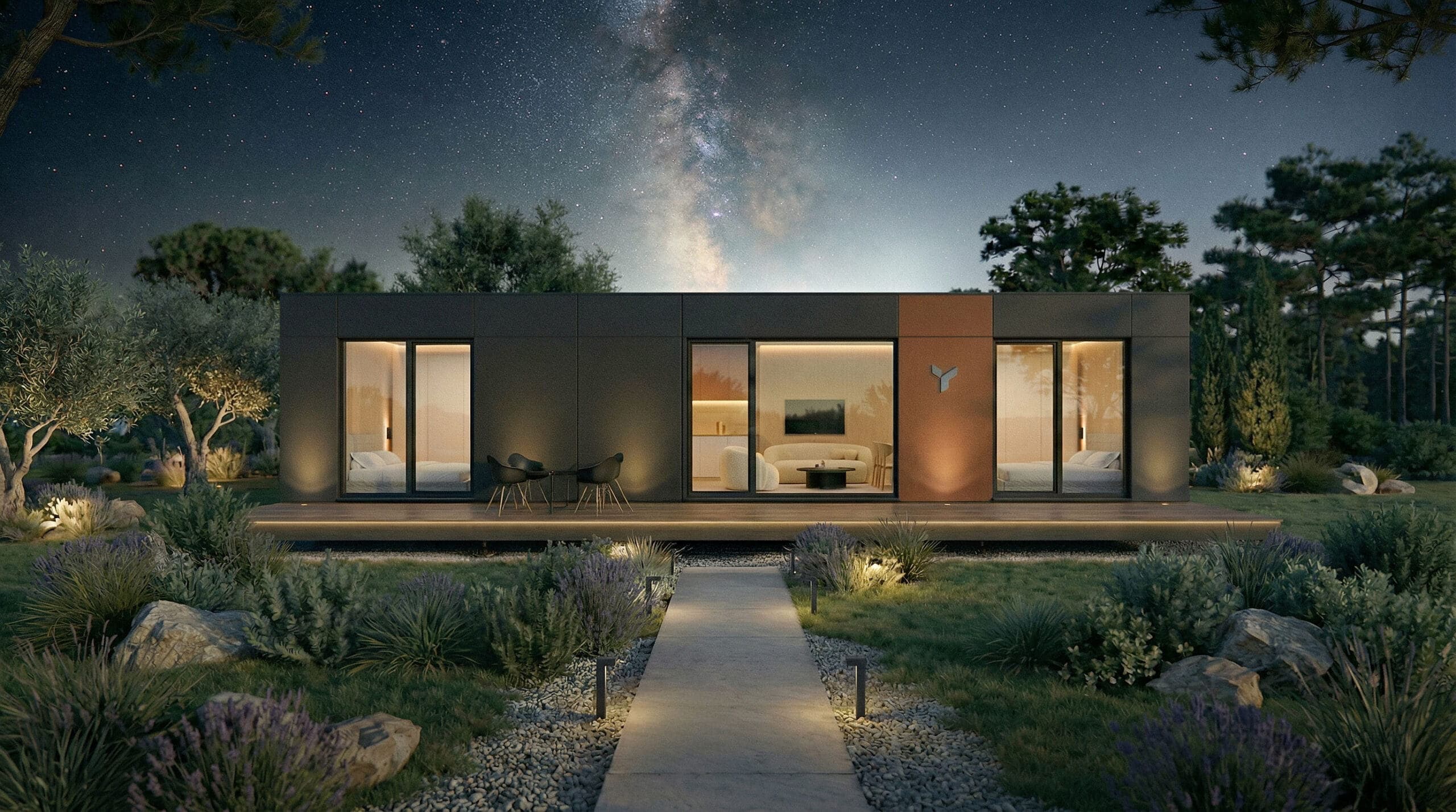 Modern POP UP modular home exterior at night with landscaped garden and warm interior lighting