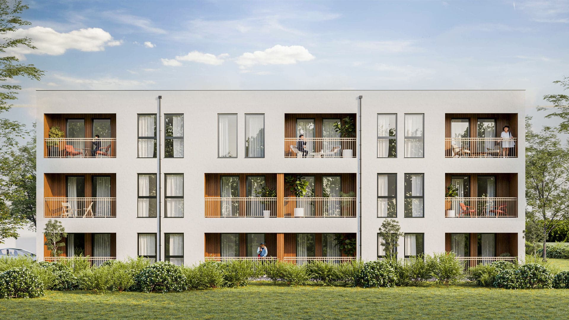 Modern multistory senior housing community with landscaped outdoor areas