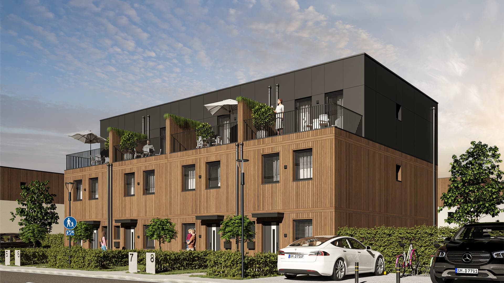 Multifamily development with multistory buildings and landscaped grounds