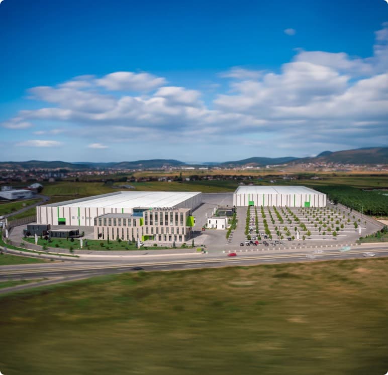 Aerial view of the InstaBuilt factory and surrounding landscape