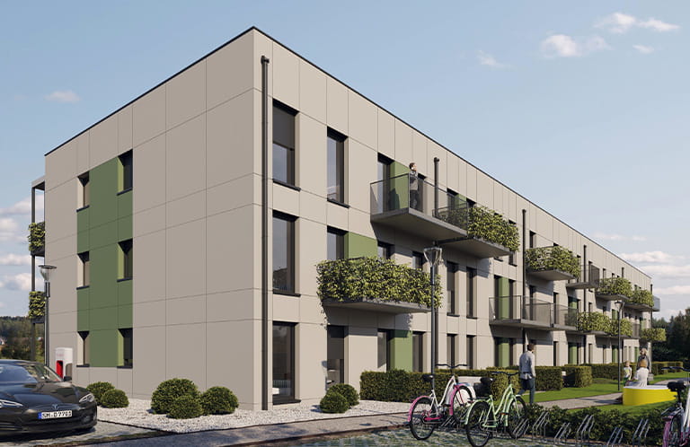 Modern three-story multifamily building with green facade accents, balconies, and landscaped street frontage
